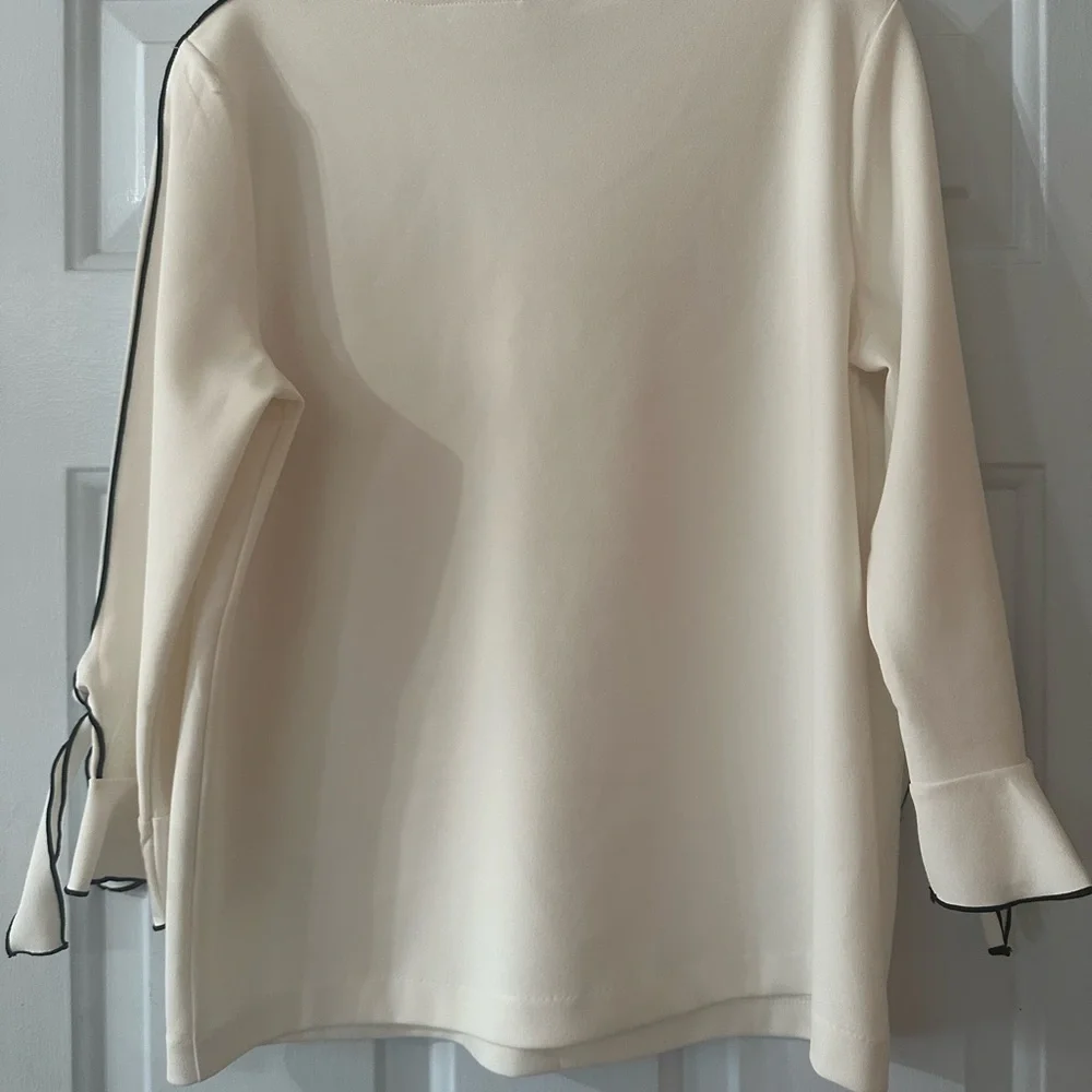 Chico's Cream Blouse with Black Piping Ruffled Tie-Sleeves. Size medium. - Picture 6 of 8